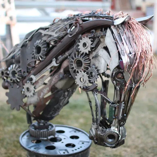 Antlered metal horse head sculpture
