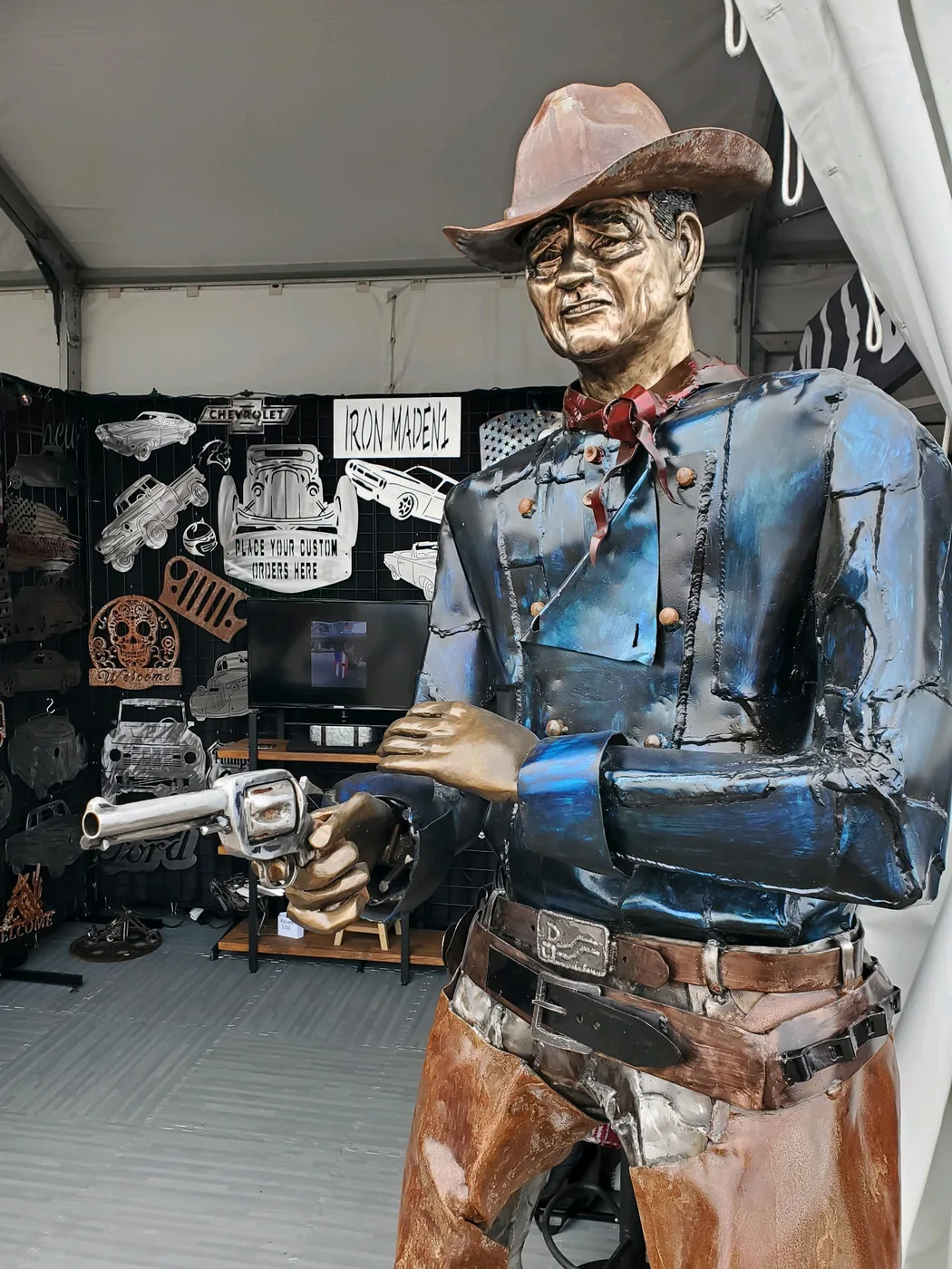 Metal cowboy figure sculpture